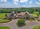 Stunning aerial view of the clubhouse, showcasing its architecture and lush surroundings at 19011 Dry Narrows Way, Charlotte, NC 28278