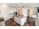 Bright kitchen featuring granite counters, an island with sink, and stainless appliances at 19011 Dry Narrows Way, Charlotte, NC 28278