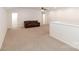 Spacious living room featuring neutral carpet and plenty of natural light at 19011 Dry Narrows Way, Charlotte, NC 28278