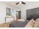 Tastefully decorated bedroom featuring hardwood floors and neutral colors for a calming atmosphere at 2013 South St, Charlotte, NC 28208
