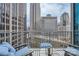 Inviting balcony with comfortable seating, views of the city skyline, and modern railings at 210 N Church St # 1507, Charlotte, NC 28202