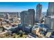Panoramic city view featuring prominent skyscrapers and vibrant cityscape below a clear blue sky at 210 N Church St # 1507, Charlotte, NC 28202