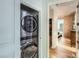 Modern laundry closet with stacked washer and dryer at 210 N Church St # 1507, Charlotte, NC 28202
