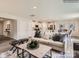 Open-concept living space featuring a comfortable sofa, modern kitchen, and dining area at 2961 Legacy Ridge Ln, Catawba, NC 28609