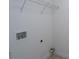 Utility room with white walls, tile flooring, and a wire rack shelf at 303 Basswood Ct, Clover, SC 29710