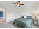 Comfortable bedroom with a ceiling fan and plush carpet, providing a relaxing retreat at 3045 Bronwood Pl, Lancaster, SC 29720