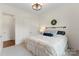 Cozy bedroom with a comfortable bed, soft carpet, and stylish lighting at 3045 Bronwood Pl, Lancaster, SC 29720