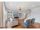 Living room boasting hardwood floors, neutral tones, and open staircase at 3045 Bronwood Pl, Lancaster, SC 29720