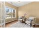 Sitting room featuring two chairs, decorative rug, and bright window views at 3045 Bronwood Pl, Lancaster, SC 29720