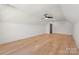 Bonus room featuring hardwood floors, ceiling fan, and great natural light at 3949 Plainview Rd, Charlotte, NC 28208