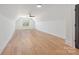 Spacious bonus room with hardwood floors and great natural light at 3949 Plainview Rd, Charlotte, NC 28208