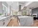 Gourmet kitchen with stone countertops, stainless appliances, and breakfast area at 3949 Plainview Rd, Charlotte, NC 28208