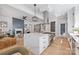 Open-concept kitchen featuring a large island, stainless steel appliances, and modern finishes, perfect for entertaining at 3949 Plainview Rd, Charlotte, NC 28208