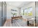 Contemporary office with hardwood floors, natural light, and a modern rug at 3949 Plainview Rd, Charlotte, NC 28208