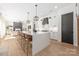 Open-concept layout seamlessly integrates kitchen, dining, and living area, perfect for modern living at 3953 Plainview Rd, Charlotte, NC 28208