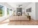 Bright living room features a modern fireplace, stylish decor, and hardwood floors at 3953 Plainview Rd, Charlotte, NC 28208