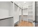 Well-organized walk-in closet with ample shelving and hanging space, ready for storage needs at 3953 Plainview Rd, Charlotte, NC 28208