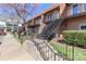 Apartment building featuring private exterior stairs leading to upper-level units at 452 S Main St # F, Davidson, NC 28036