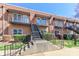 Charming brick apartment building featuring private balconies and inviting staircases, perfect for modern urban living at 452 S Main St # F, Davidson, NC 28036