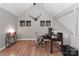 Office space with hardwood floors, desk, computer and natural lighting at 452 S Main St # F, Davidson, NC 28036