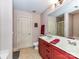 Bathroom with double sinks, granite countertops, and modern fixtures at 4708 Chantress Ln, Monroe, NC 28110