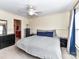 Bedroom with queen bed, ceiling fan, and neutral decor at 4708 Chantress Ln, Monroe, NC 28110