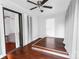 This bright bedroom features sleek hardwood flooring, and direct access to a covered back porch at 4715 Cricklewood Ln, Charlotte, NC 28212