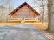 Inviting brick house with a classic design and an expansive front porch at 5687 Putuptoe Pl, Norwood, NC 28128