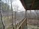 View from the backyard pavilion looking out to the forest and small creek at 5687 Putuptoe Pl, Norwood, NC 28128