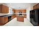 Functional kitchen with stainless appliances, a kitchen island and tile floors at 576 Putting Dr, Fort Mill, SC 29715