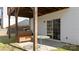 Cozy covered patio with a table, perfect for relaxing and enjoying the backyard view at 576 Putting Dr, Fort Mill, SC 29715