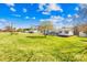 Cozy home with large yard, perfect for outdoor activities and enjoying the tranquility of a private country setting at 590 County Line Rd, Stony Point, NC 28678
