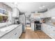 Functional kitchen features stainless appliances and ample cabinet space for storage at 590 County Line Rd, Stony Point, NC 28678
