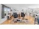 Inviting living room features hardwood floors and comfortable seating near bright windows at 590 County Line Rd, Stony Point, NC 28678
