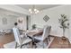 Cozy dining room featuring a stylish table setting and elegant decor at 7316 Strawberry Fields Ln, Charlotte, NC 28278