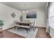 Formal dining room with an elegant chandelier and tasteful decor at 7316 Strawberry Fields Ln, Charlotte, NC 28278