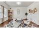 Inviting living room with modern decor, comfortable seating, and ample natural light at 7316 Strawberry Fields Ln, Charlotte, NC 28278
