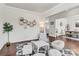 Open-concept living area featuring modern furniture and stylish decor at 7316 Strawberry Fields Ln, Charlotte, NC 28278