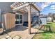 Cozy patio area with a pergola and outdoor seating, ideal for relaxing or enjoying a meal at 7316 Strawberry Fields Ln, Charlotte, NC 28278