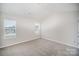 Empty bedroom with carpet and windows bringing in natural light at 8203 Gabon Ct, Charlotte, NC 28215