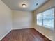 Bright bedroom with natural light and hardwood flooring at 8906 Paddle Oak Rd, Charlotte, NC 28227