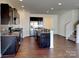 Modern kitchen featuring stainless steel appliances, granite countertops, and stylish backsplash at 8906 Paddle Oak Rd, Charlotte, NC 28227