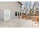 Back deck with wooden railing at 8915 Myra Way # 39, Charlotte, NC 28215