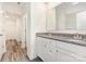 Bathroom featuring granite counters and double sinks with a view of the walk-in closet at 8915 Myra Way # 39, Charlotte, NC 28215