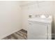 Laundry room with washer hookups and storage shelf at 8915 Myra Way # 39, Charlotte, NC 28215