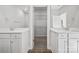 Bright bathroom featuring double vanities and walk-in closet provides lots of storage at 902 Westminster Dr, Statesville, NC 28677