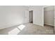Cozy bedroom with closet and carpeted floor at 902 Westminster Dr, Statesville, NC 28677