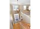 Grand foyer with a soaring ceiling, a decorative chandelier, and hardwood floors leading to the upper level at 10625 Olde Irongate Ln, Mint Hill, NC 28227
