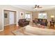Spacious living room with hardwood floors, and cozy seating, perfect for Gathering gatherings at 10625 Olde Irongate Ln, Mint Hill, NC 28227