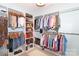 Spacious walk-in closet with custom shelving and rods for optimal organization and storage at 10625 Olde Irongate Ln, Mint Hill, NC 28227